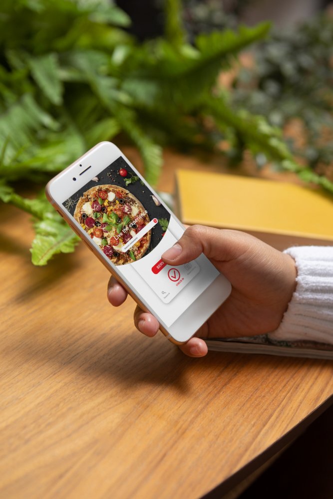 close-up-hand-holding-device